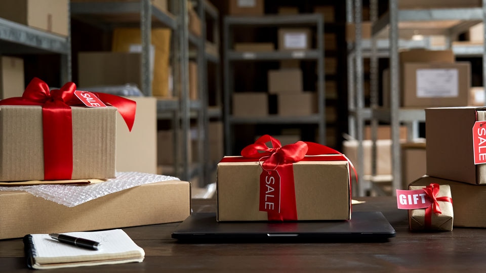 holiday wrapped packages on desk in retail warehouse