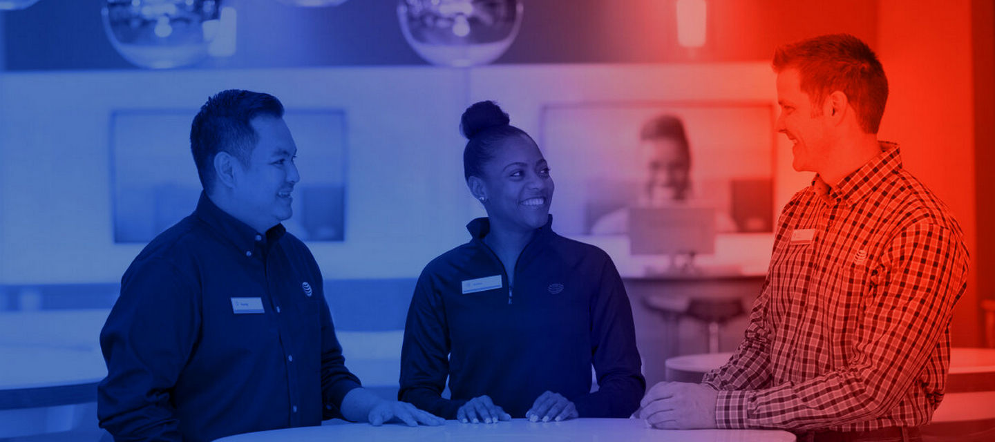 false color image of three store associates in an att retail store