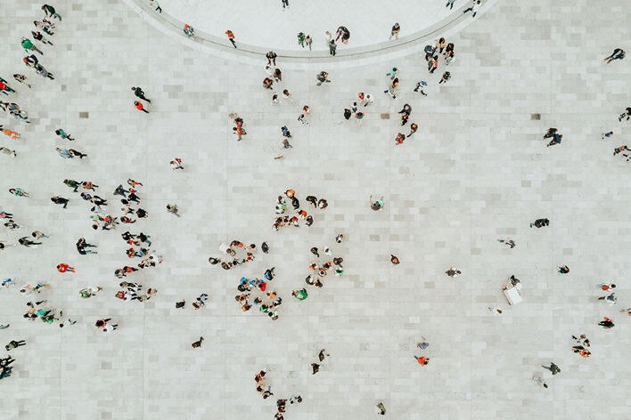 high overhead view of people in open plaza