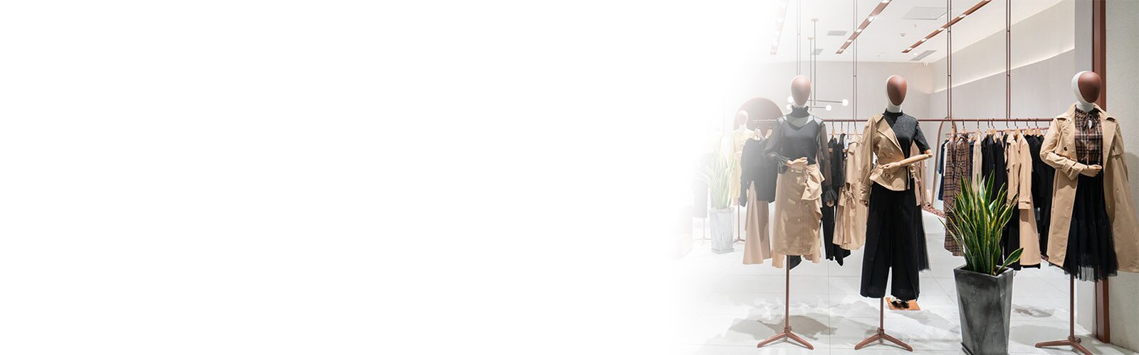 mannequins displaying womens clothing in upscale retail apparel store