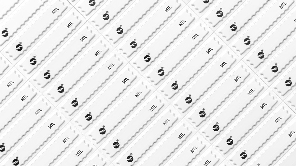 sheet of sensormatic adhesive metal labels
