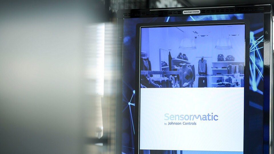 Digital display kiosk featuring Sensormatic Branding