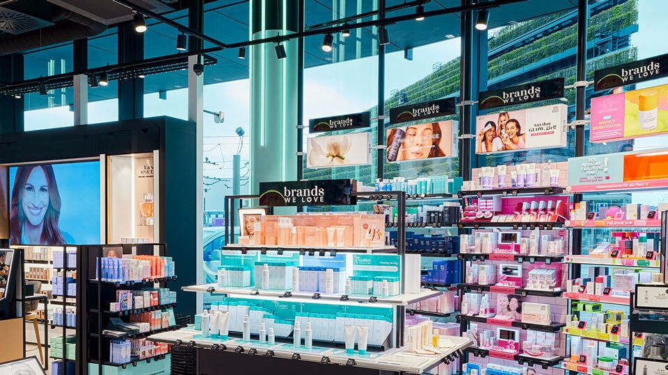 interior of douglas beauty supply retail store displaying large array of cosmetics