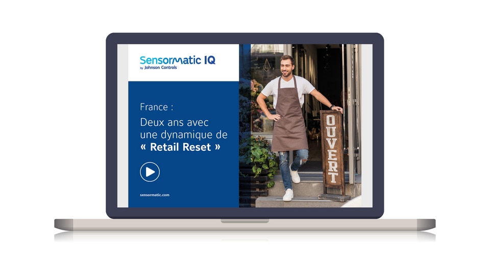 laptop displaying cover of sensormatic retail reset report for france