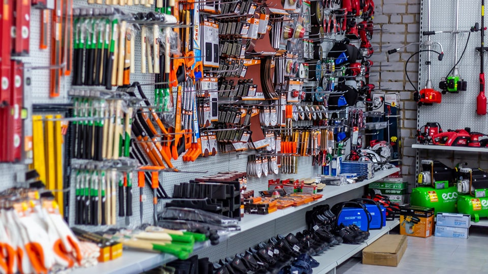 wall of tools on display in retail hardware diy store