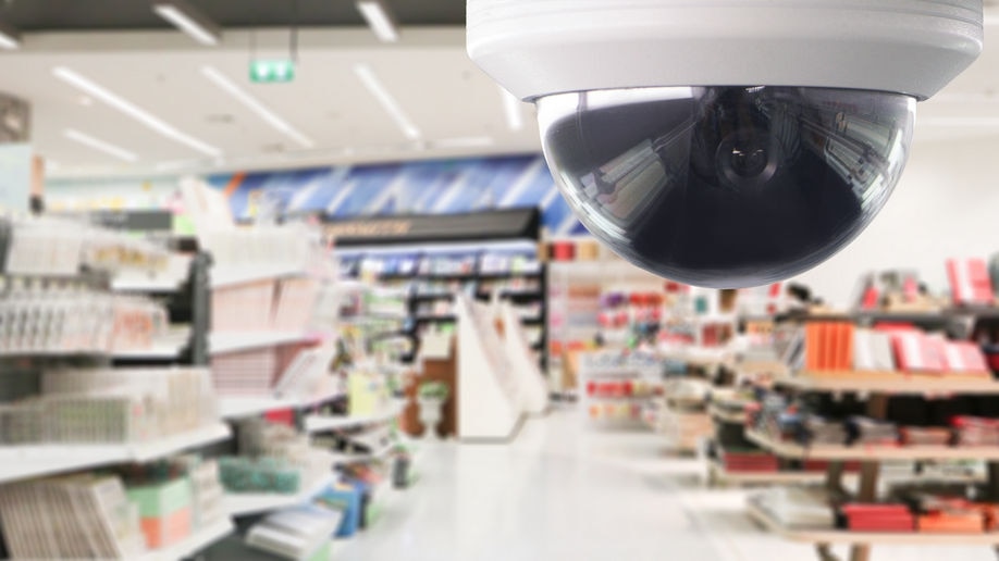 360 security video camera on ceiling of retail store
