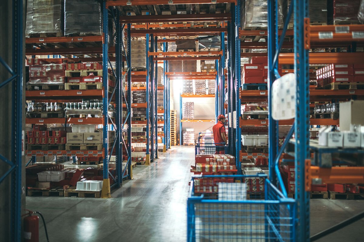 Manufacturer warehouse with merchandise on shelves