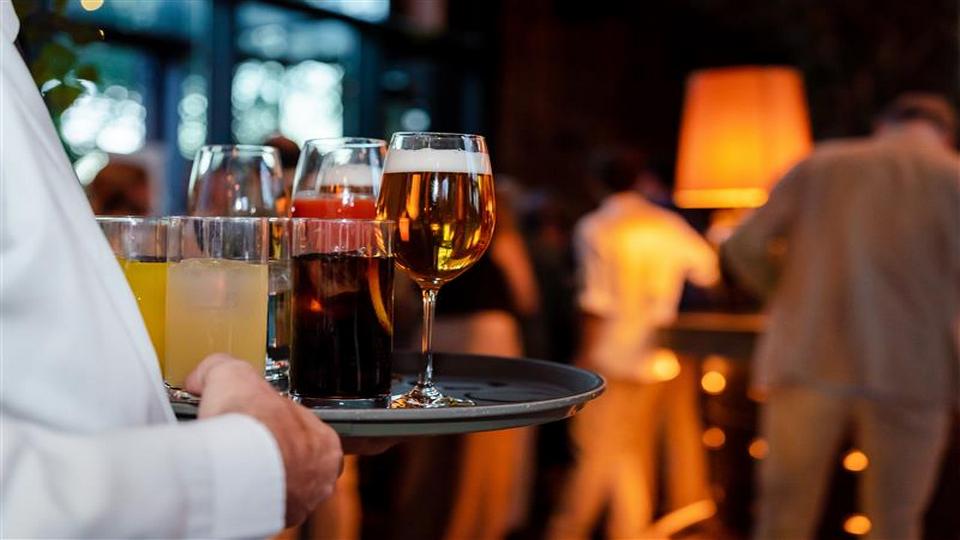 waiter holding a tray