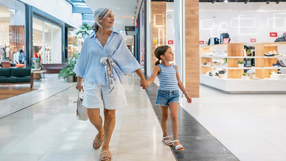 Women with her Daughter in Mall