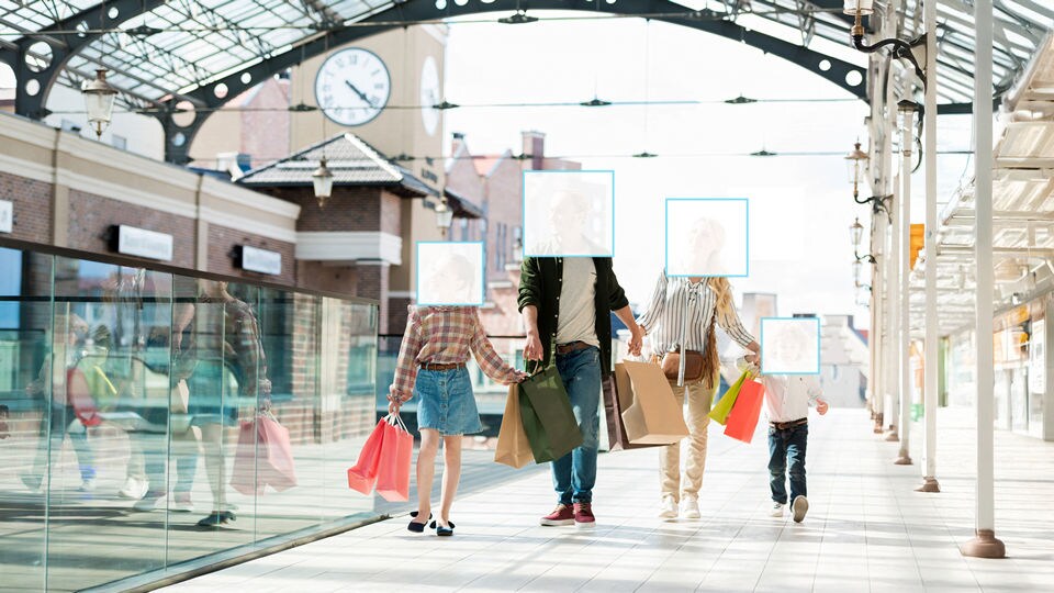 Family shopping in a mall and returning
