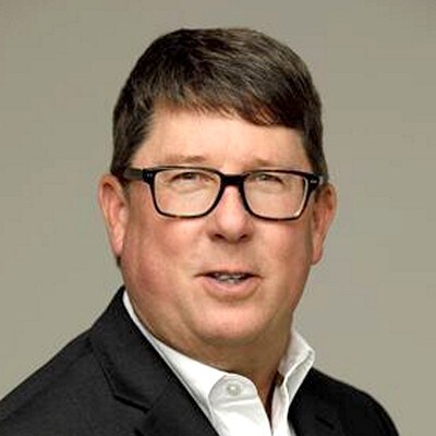 headshot of michael love of boot barn at nrf retails big show 2026 conference 